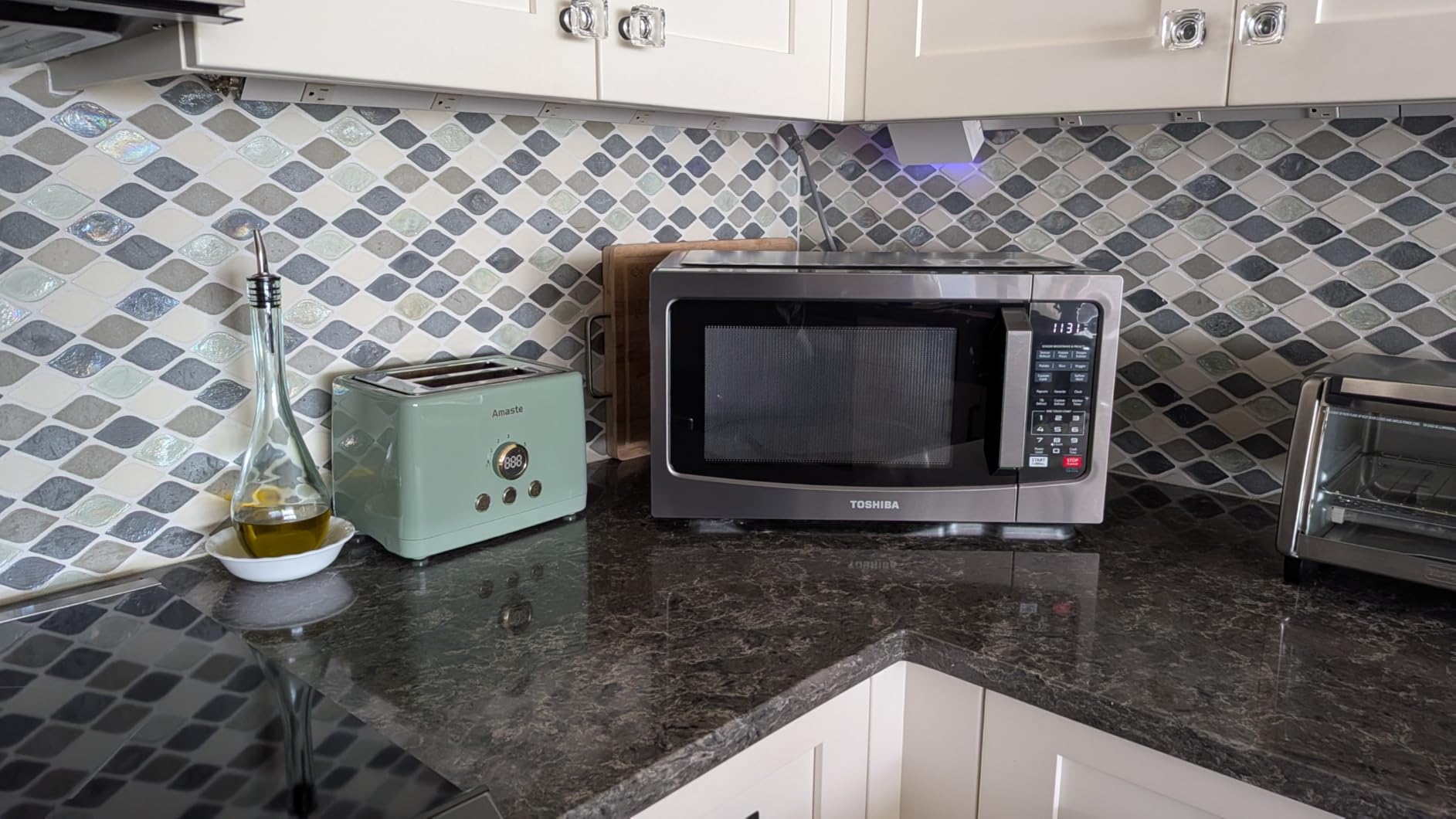 TOSHIBA EM131A5C-BS Countertop Microwave Ovens 1.2 Cu Ft, Smart Humidity Sensor, 12 Auto Menus, Mute Function, ECO Mode, 1000W, Black customer photo 1