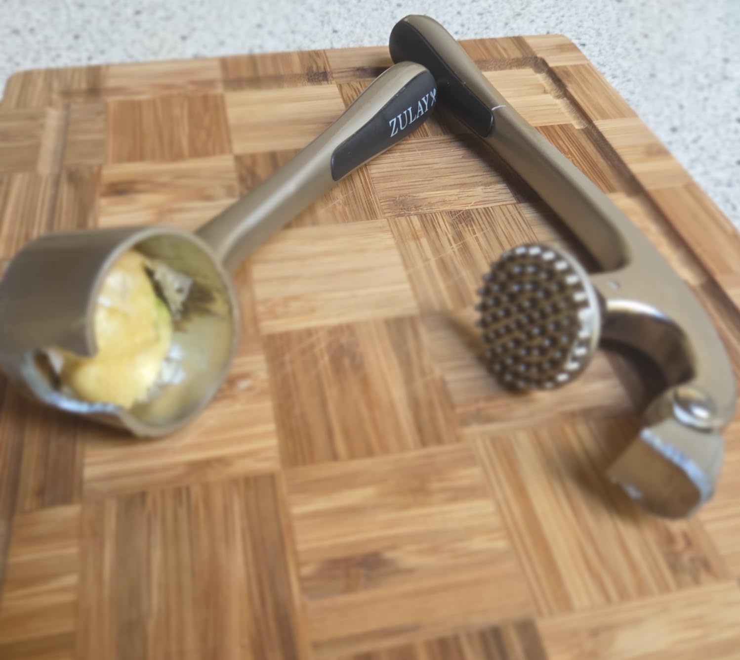 Zulay Kitchen Premium Garlic Press Set - Rust Proof Professional Garlic Mincer Tool - Easy-Squeeze, Easy-Clean with Soft, Ergonomic Handle - Silicone Garlic Peeler & Brush (Silver) customer photo 2