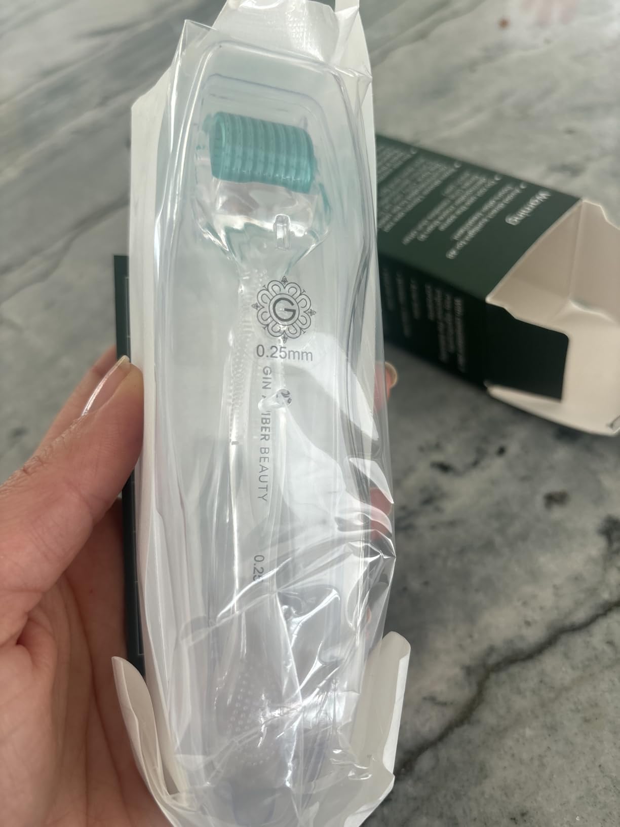 Gin Amber Beauty Derma Roller for Face | 192 Stainless Steel Needles | 0.25mm Skincare Tool for Serum Absorption & Skin Texture | CE & RoHS Certified customer photo 1