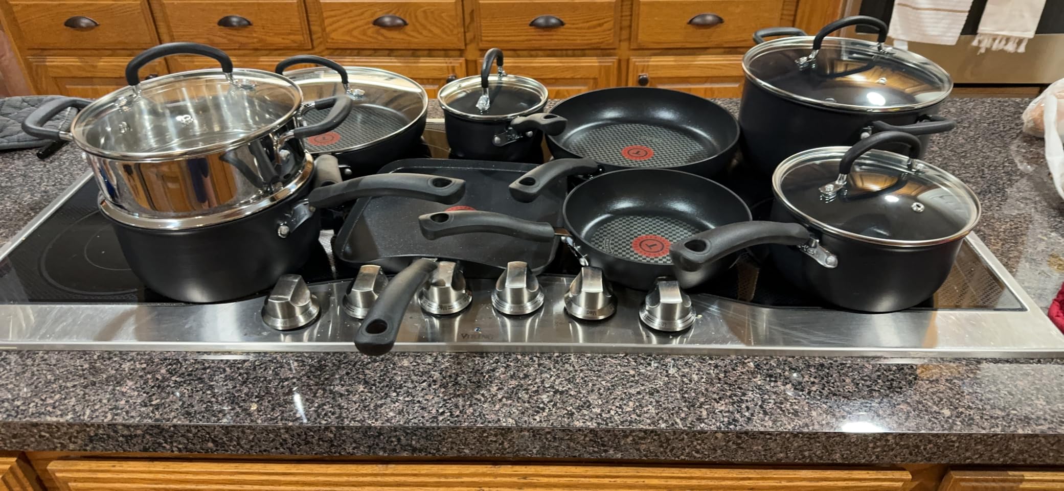T-fal Ultimate Hard Anodized Nonstick Pots and Pans Set, 14-Piece, Onyx | Titanium nonstick coating, Thermo-Spot heat indicator, Oven safe to 400F, Dishwasher safe, All stovetops except induction customer photo 2
