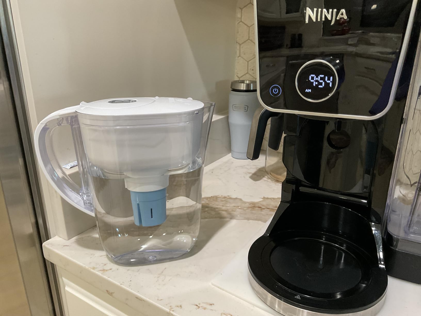 Brita Large 10-Cup Elite Water Filter Pitcher, WQA NSF/ANSI Certified, Reduces 99% of Lead, Microplastics, & 30 Contaminants, BPA-Free, Removes Chlorine Taste & Odor, 1 Filter Included, White customer photo 2