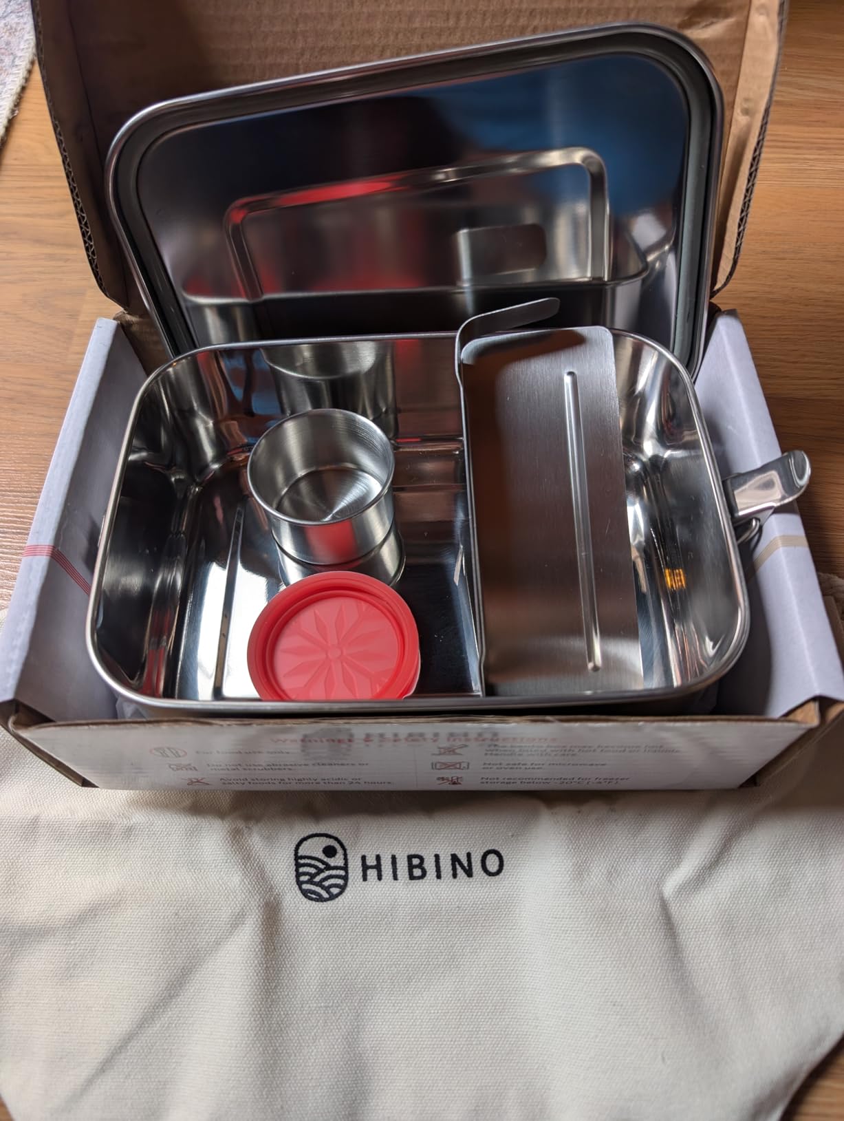HIBINO Stainless Steel Bento Box 1200ml | Leakproof Bento Box for Adults | Removable Divider | Includes Sauce Container & Cotton Kinchaku Bag | BPA-Free | Designed in Japan customer photo 1