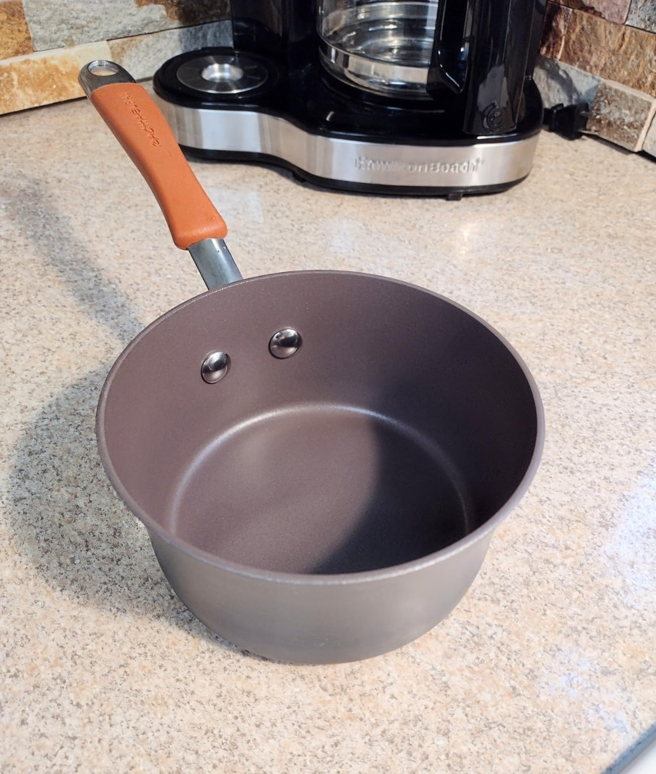 Rachael Ray Cucina Dishwasher-Safe Hard-Anodized Pots and Pans Set Non Stick Cookware, 12-Piece, Gray with Red Handles customer photo 1