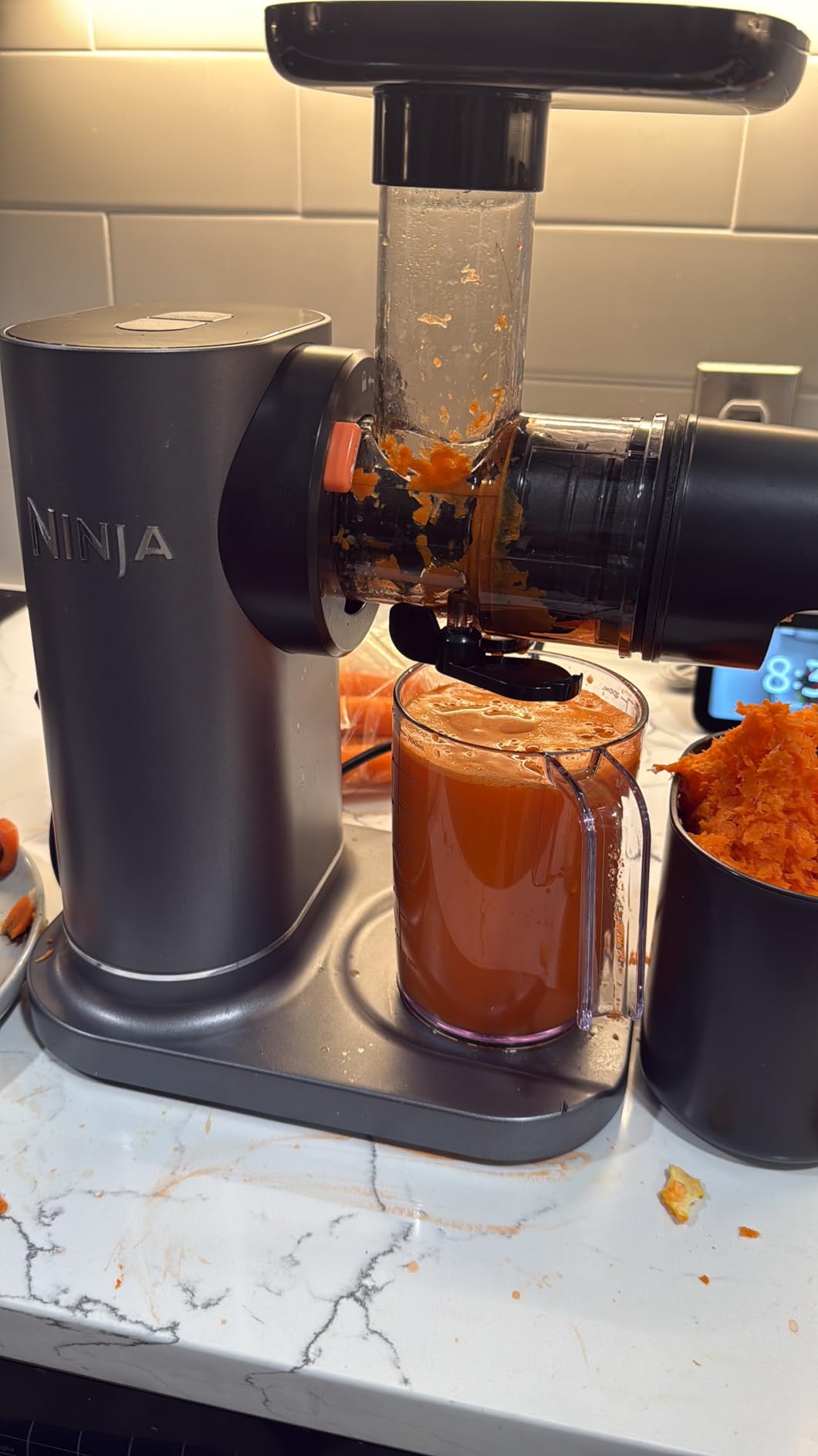 Ninja NeverClog Cold Press Juicer, 24oz Jug, 36oz Pulp, Charcoal, JC151 | 150W high-torque auger juices fibrous fruits & veggies. Total Pulp Control, 2 one-touch programs. Dishwasher safe. customer photo 2